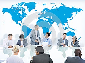 Business People Having a Discussion and World Map