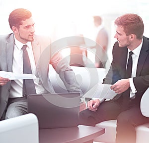 Business people Having Meeting Around Table In Modern Office