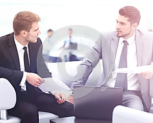 Business people Having Meeting Around Table In Modern Office