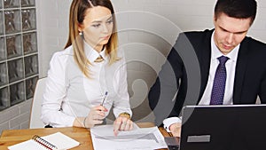 Business people Having Meeting Around Table In Modern Office