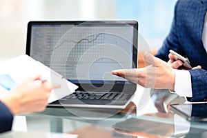 Business people Having Meeting Around Table In Modern Office