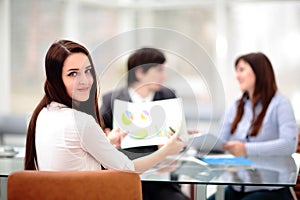 Business people Having Meeting Around Table In Modern Office