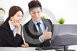 Business people Having Meeting and looking the compute