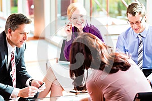 Business people having meeting in office