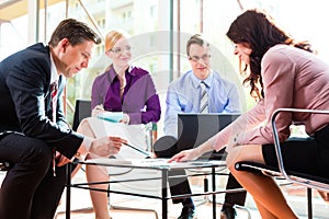 Business people having meeting in office