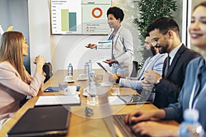 Business people having a meeting or presentation and seminar in the office.