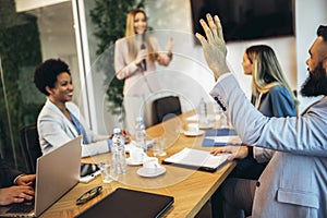 Business people having a meeting or presentation and seminar in the office.