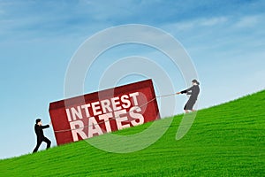 Business people with higher interest rates photo