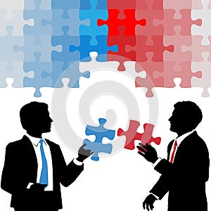 Business people hold collaboration puzzle solution