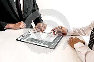 Business people hold a job profile and talk to job applicants for job interviews about careers and business concepts