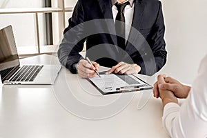 Business people hold a job profile and talk to job applicants for job interviews about careers and business concepts