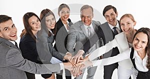 Business people hold pile hands