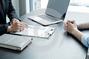 Business people hold a resume and talk to job applicants for job interviews about careers and Her personal history in the company