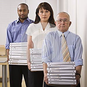 Business People Holding Binders