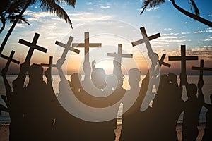 Business People Holding Crosses On Shore At Beach