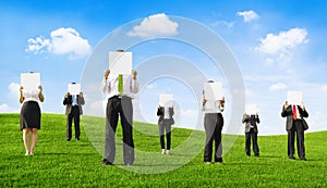 Business People Holding Empty Placard Outdoors