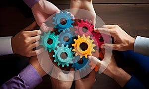 Business People holding Gears and Teamwork Concept, Business team connect pieces of gears. Teamwork, partnership and integration c