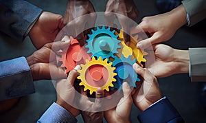 Business People holding Gears and Teamwork Concept, Business team connect pieces of gears. Teamwork, partnership and integration c