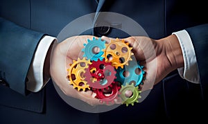 Business People holding Gears and Teamwork Concept, Business team connect pieces of gears. Teamwork, partnership and integration c