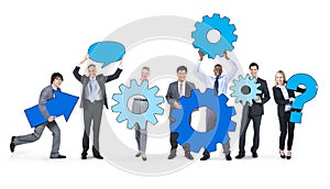 Business People Holding Gears Together Concept