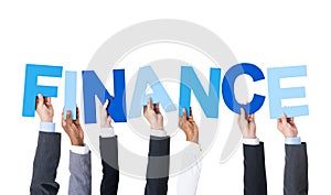 Business People Holding the Word Finance