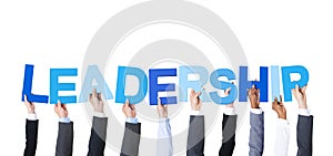 Business People Holding the Word Leadership