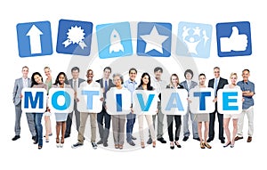 Business People Holding Word Motivate