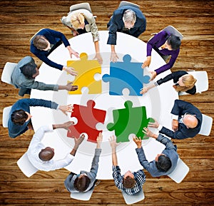 Business People Jigsaw Puzzle Collaboration Team Concept photo