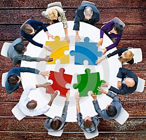 Business People Jigsaw Puzzle Collaboration Team Concept photo