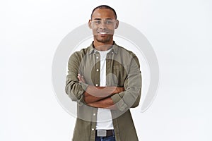 Business, people and lifestyle concept. Portrait of handsome african american man cross hands on chest and smiling