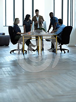 Business people, meeting and coach training staff in corporate office, boardroom or conference table. Group of employee