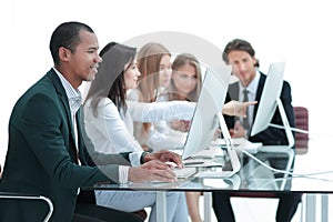 Business People At The Meeting Discuss Current Issues At The Modern Office