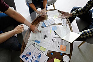 Business people meeting at office writing memos on sticky notes. planning strategy and brainstorming, colleagues thinking concept