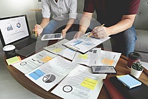 Business people meeting at office writing memos on sticky notes. planning strategy and brainstorming, colleagues thinking concept