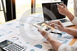 Business People Meeting to analyse and discuss and brainstorming the financial report chart data in office, Financial advisor