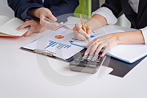 Business people meeting to analyze and discuss the situation on the financial report in meeting room.