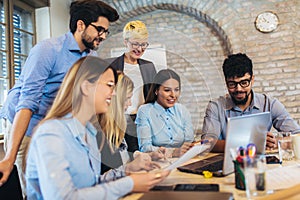 Business people meeting to discuss ideas in modern office