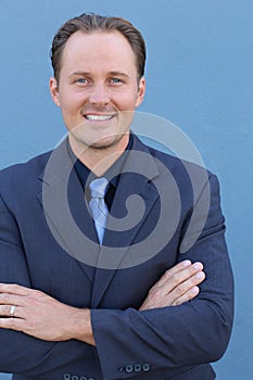 Business, people and office concept - happy smiling businessman in suit