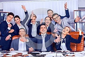 Business people office life of team people are happy with hand up.