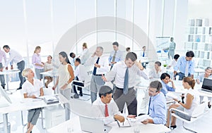 Business People in the Office on Rush Hour