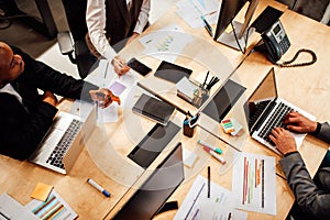 Business people in office work together during a meeting