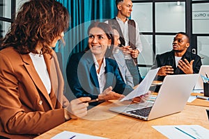 Business people in office work together during a meeting