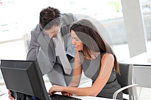 Business people at office working on computer