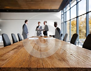 Business people in out of focus modern meeting room