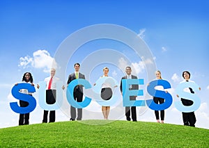Business People Outdoors Holding Text Success