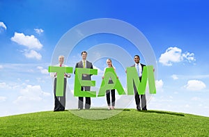 Business People Outdoors Holding Text Team