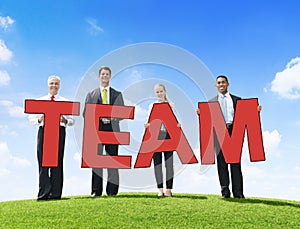 Business People Outdoors Holding Text Team