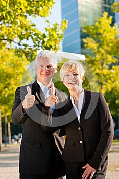 Business people in a park outdoors