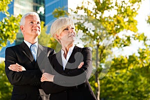 Business people in a park outdoors