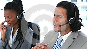 Business people on the phone with headsets
